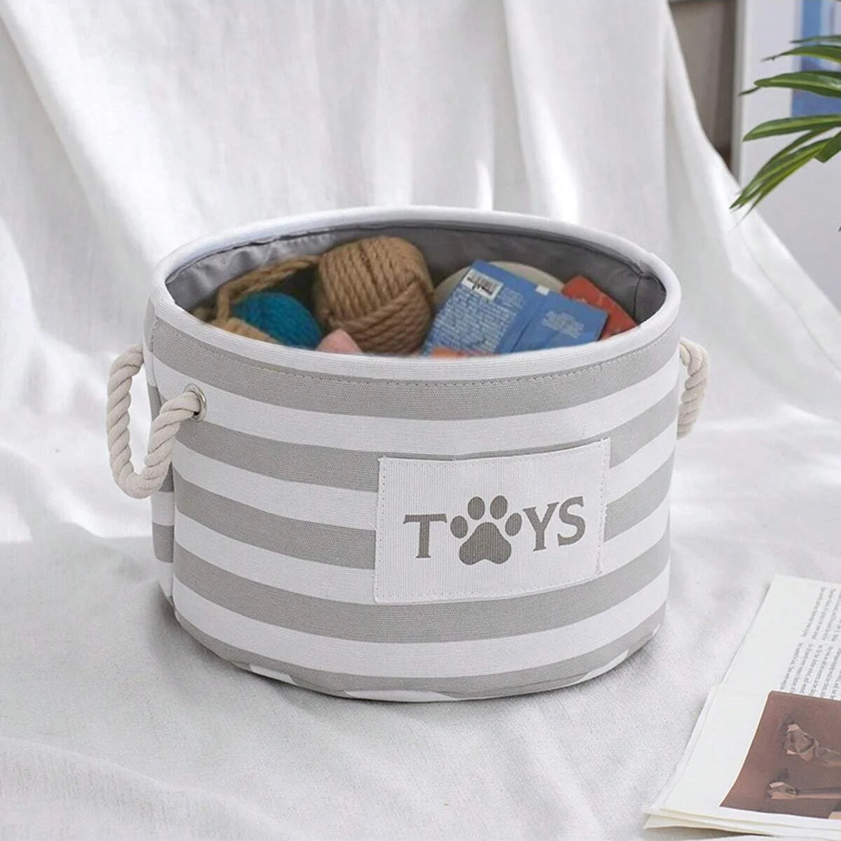 Panier rond à rayures pour jouets de chien