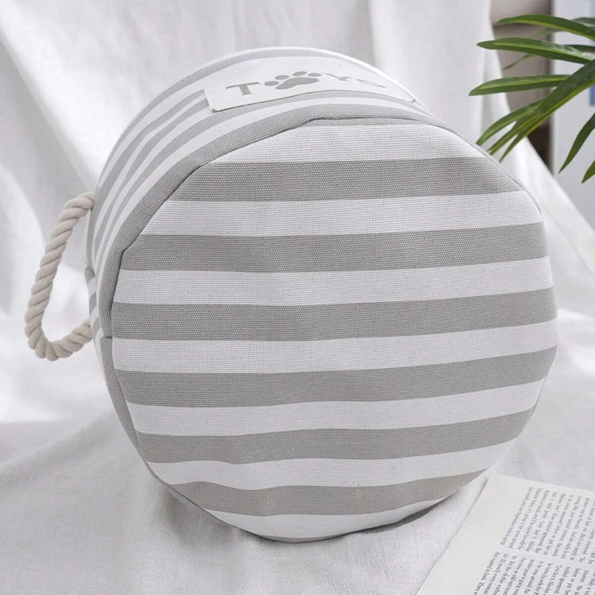 Panier rond à rayures pour jouets de chien