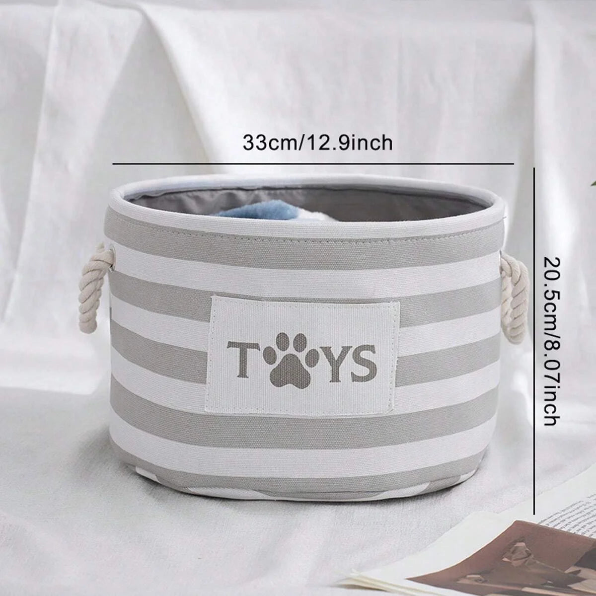 Panier rond à rayures pour jouets de chien