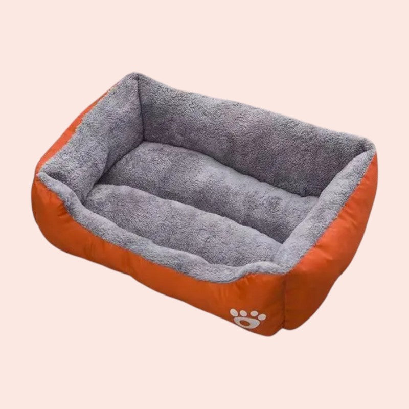 Cama impermeable naranja para perros: comodidad y protección sin límites